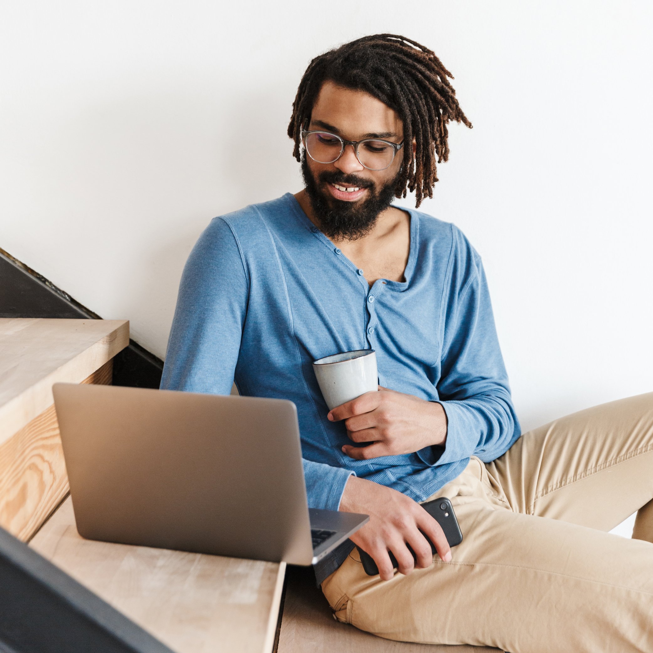 man reading on computer